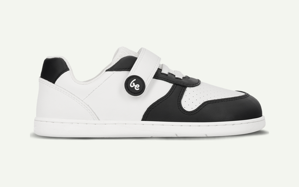 Be Lenka | Scoot | Leather sneakers fotograferad från sidan med utpekade detaljer